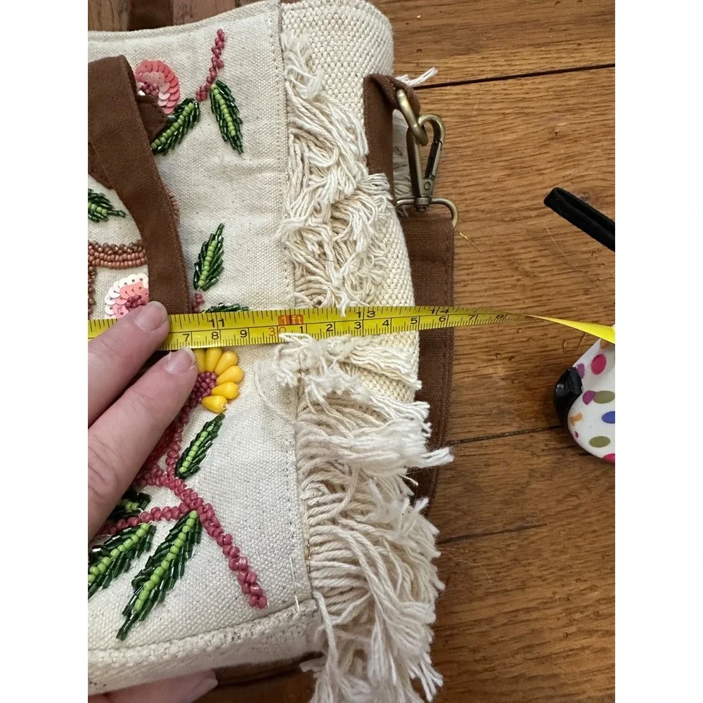 America and beyond cream‎ fringed purse with beaded animals and palm tree